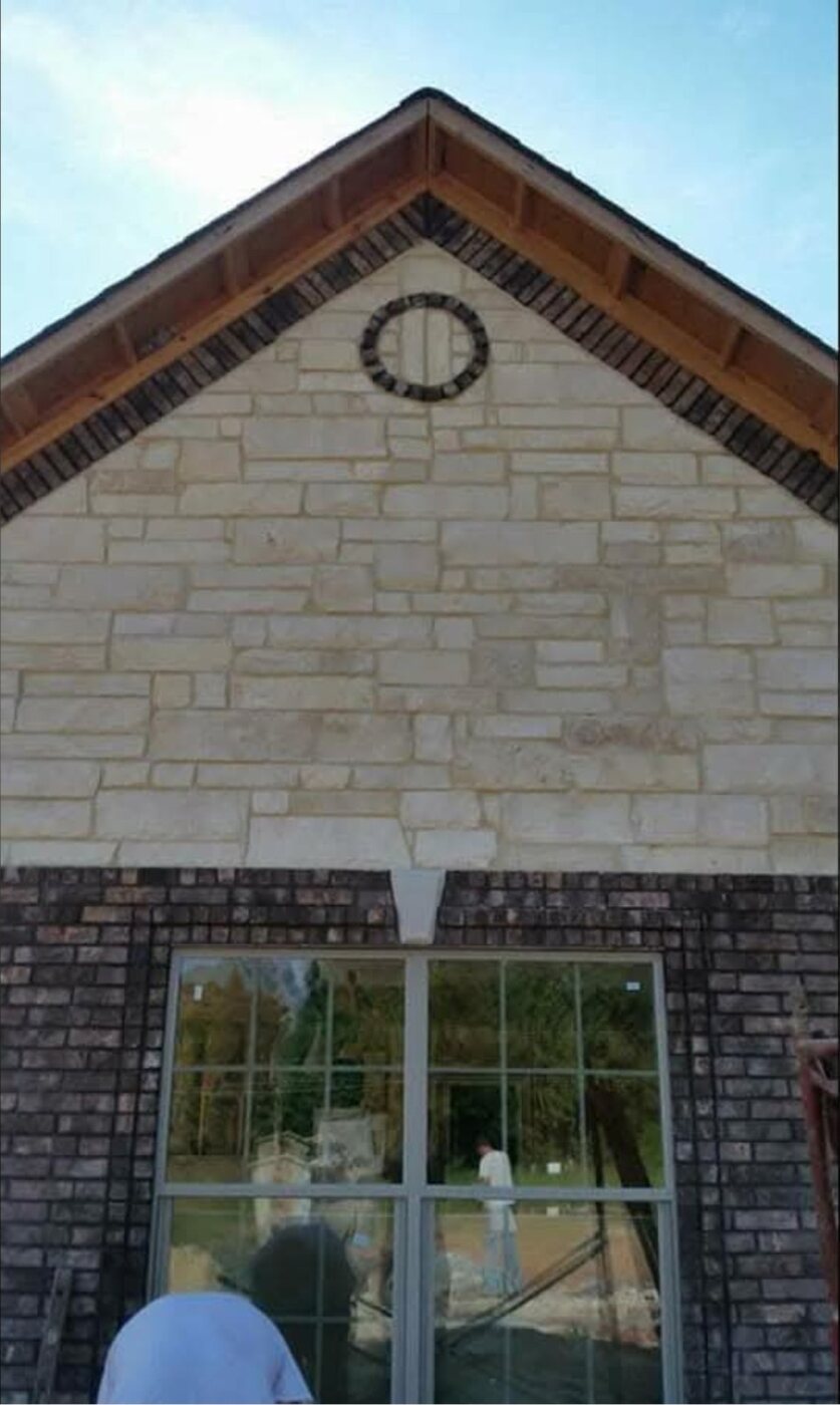 Stone gable with contrasting brick accents
